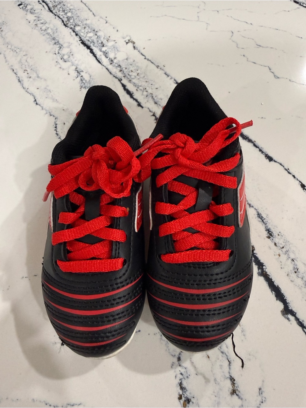 Kids Black and Red soccer cleats